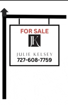 a for sale sign for julie kelsey 727-608-7758