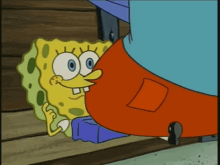a cartoon character named spongebob is standing next to another cartoon character