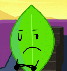 a green leaf with a sad face and a black mustache