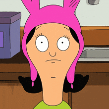 a cartoon character is wearing a pink bunny hat and making a funny face