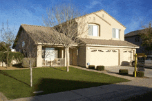 a house with a sign in front of it that says " for sale "