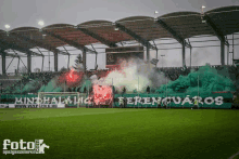 a soccer stadium with a banner that says ferencvaros