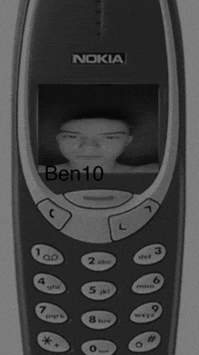 a black and white photo of a nokia cell phone