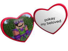 a heart shaped mirror with a picture of a minecraft character and the words pokay my beloved