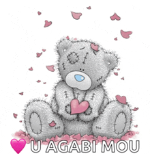 a teddy bear is holding a pink heart with the words u agabi mou written below it