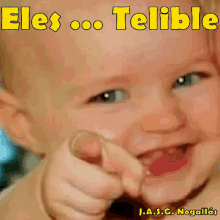 a picture of a baby pointing at the camera with the words " eles ... telible " on the bottom