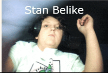 a boy wearing headphones with the name stan belike written above him