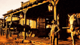 a man in a cowboy hat stands in front of a wooden building with a sign that says ' texas ' on it