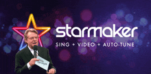 a man in a suit stands in front of a starmaker sign