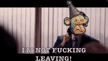 a man in a suit and tie is talking on a cell phone with a pixelated monkey mask on his face .