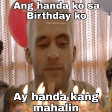 a man blowing out candles on a birthday cake with a caption that says ang handa ko sa birthday ko ay handa kang mahalin