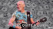 a man is playing a guitar in front of a pile of money and the words he was quite a guy .