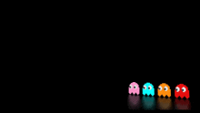 a row of pac man ghosts are lined up in a row