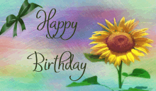 a happy birthday card with a sunflower and a green bow