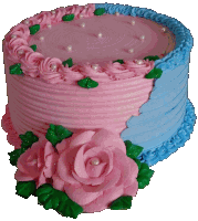 a pink and blue cake with flowers on it