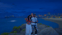 a man and a woman are posing for a picture in front of a city