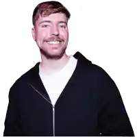 a man wearing a black hoodie and a white shirt smiles for the camera
