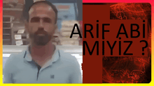 a man with a beard is standing in front of a red sign that says " arif abi miyiz "