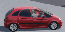 a red car with a man in the driver 's seat is parked on the side of the road