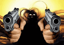 a person is holding two guns in their hands in front of a ghostly face .