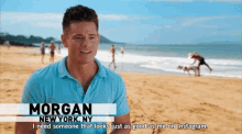 a man named morgan from new york ny is standing on the beach