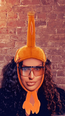 a woman wearing a turkey hat and glasses