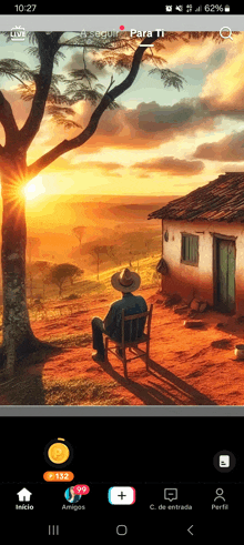 a man in a cowboy hat sits in front of a house