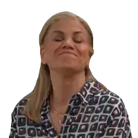 a woman with her eyes closed is wearing a shirt with a pattern of numbers on it