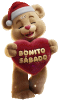 a teddy bear is wearing a santa hat and holding a red heart that says bonito sabado