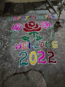 a colorful drawing of flowers and the words happy new year welcome 2022