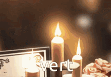 a picture of candles with the word vert in the corner