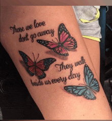 a tattoo of three butterflies with the words those we love don t go away