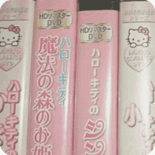 a row of hello kitty dvds are lined up