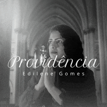 a black and white photo of a woman in a church with the words providencia edilene gomes on the bottom