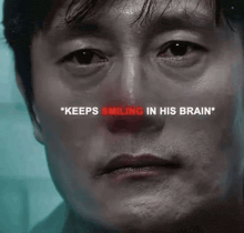 a close up of a man 's face with the words `` keeps smiling in his brain '' written above it .
