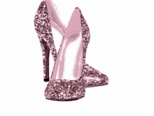 a pair of pink high heels with glitter on them on a white background