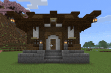 a minecraft screenshot of a house with a lantern on the front