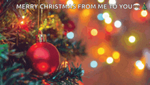 a merry christmas from me to you greeting card with a christmas tree