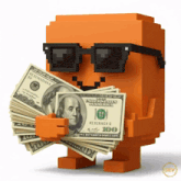 a toy holding a stack of 100 dollars
