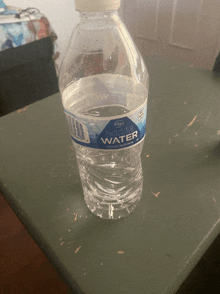 a bottle of purified water is on a table