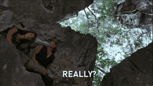 a group of people in a cave with the words " really " above them