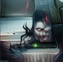 a laptop with a picture of a woman on it