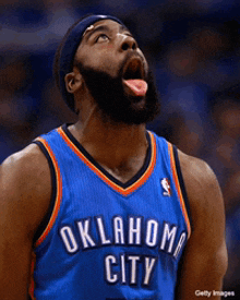 an oklahoma city basketball player with his tongue out