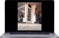 a macbook pro is open to a video that says oh shit a mac on the screen