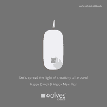 an advertisement for wolves creata with a mouse and a lit candle