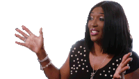 a woman wearing a black shirt with pearls on it is making a funny face