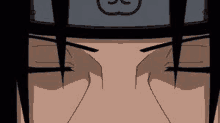 a close up of itachi uchiha 's face with a headband on his head .