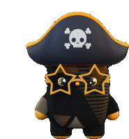 a stuffed animal wearing a pirate hat and star glasses