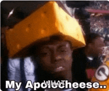 a man is wearing a cheese hat and saying `` my ap what cheese . ''