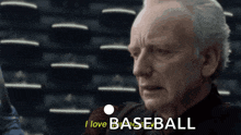 a man says i love baseball in front of a stadium